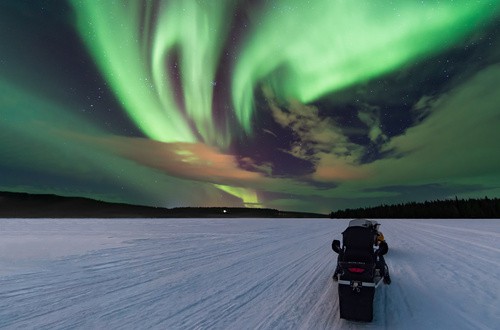 <em>Northern Lights snowmobile safari in Rovaniemi, Lapland</em>