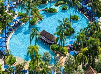 Luxury beachfront resort in Phuket with private beach access, ocean-view pools, and tropical spa experiences at Merlin Beach “luxury beachfront resort”, “Phuket”, “private beach”, “spa experiences”, “Merlin Beach”, “Thailand”