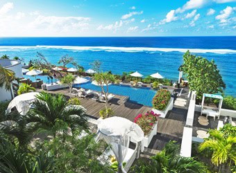Clifftop view of Samabe Bali Suites and Villas overlooking the Indian Ocean in Nusa Dua
