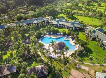 Tropical garden and beachfront view at The Naviti Resort on Fiji’s Coral Coast