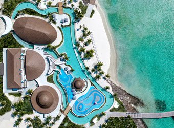Family-friendly all-inclusive resort in the Maldives with overwater villas, lagoon views, and fun-filled water activities