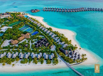 Premium all-inclusive resort in the Maldives with overwater villas, private pools, and oceanfront fine dining at Heritance Aarah