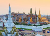 Ancient temple surrounded by stone carvings and traditional architecture