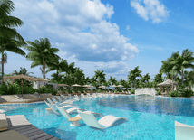 Balinese resort with tropical pools, palm trees, and modern architecture