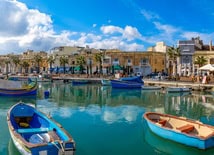 Blue waters near a wharf in Malta on a sunny day