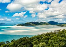 White sand beach and turquoise waters in the Whitsundays