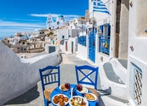 Cafe in the streets of Santorini on a sunny day