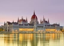 Lighted parliament building in Budapest at night