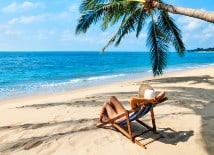 Resort Holidays - relaxing on beach