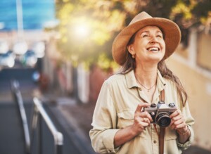 Solo woman traveller with camera