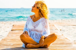 woman enjoying the ocean on her own