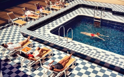 Lady swimming in pool on cruise ship